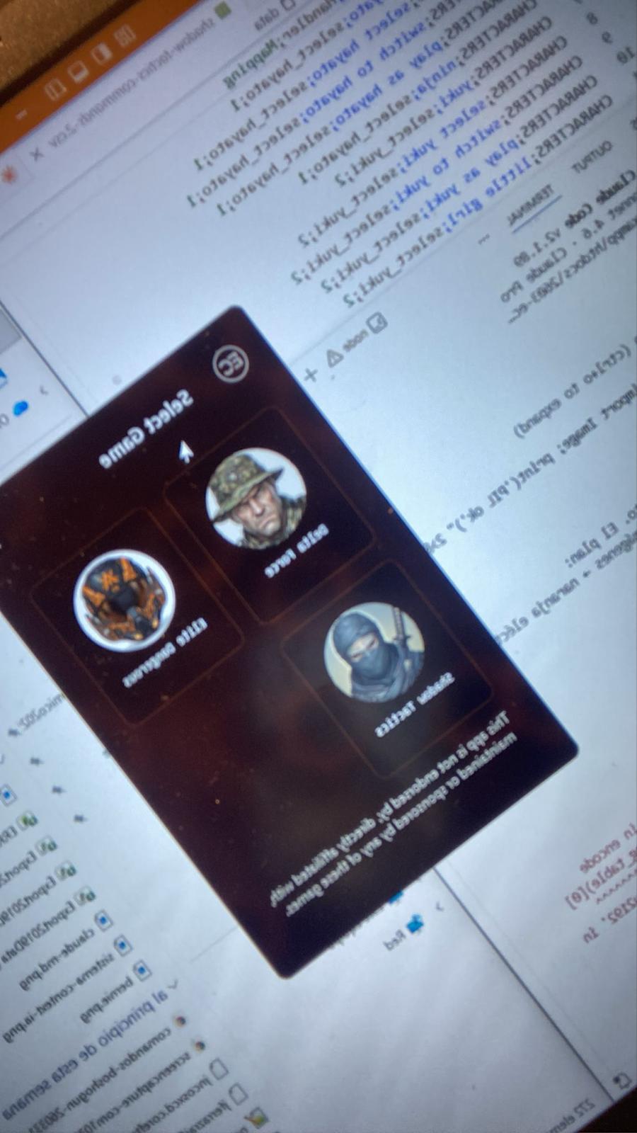 The same hexagon-background Select Game screen, photographed straight off the monitor