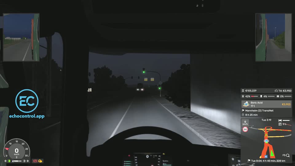 The same Euro Truck Simulator 2 road a moment later, lit by the truck's headlights
